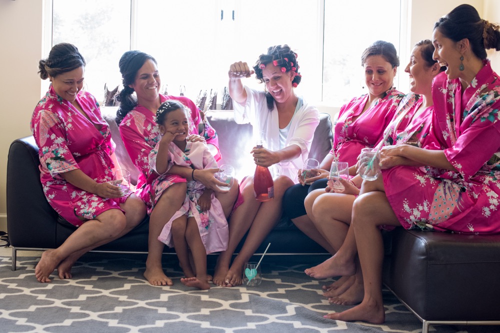 bride popping campaign with bridesmaids