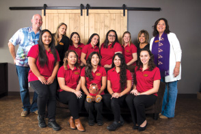 Group photo of Kamuela Inn owners and staff